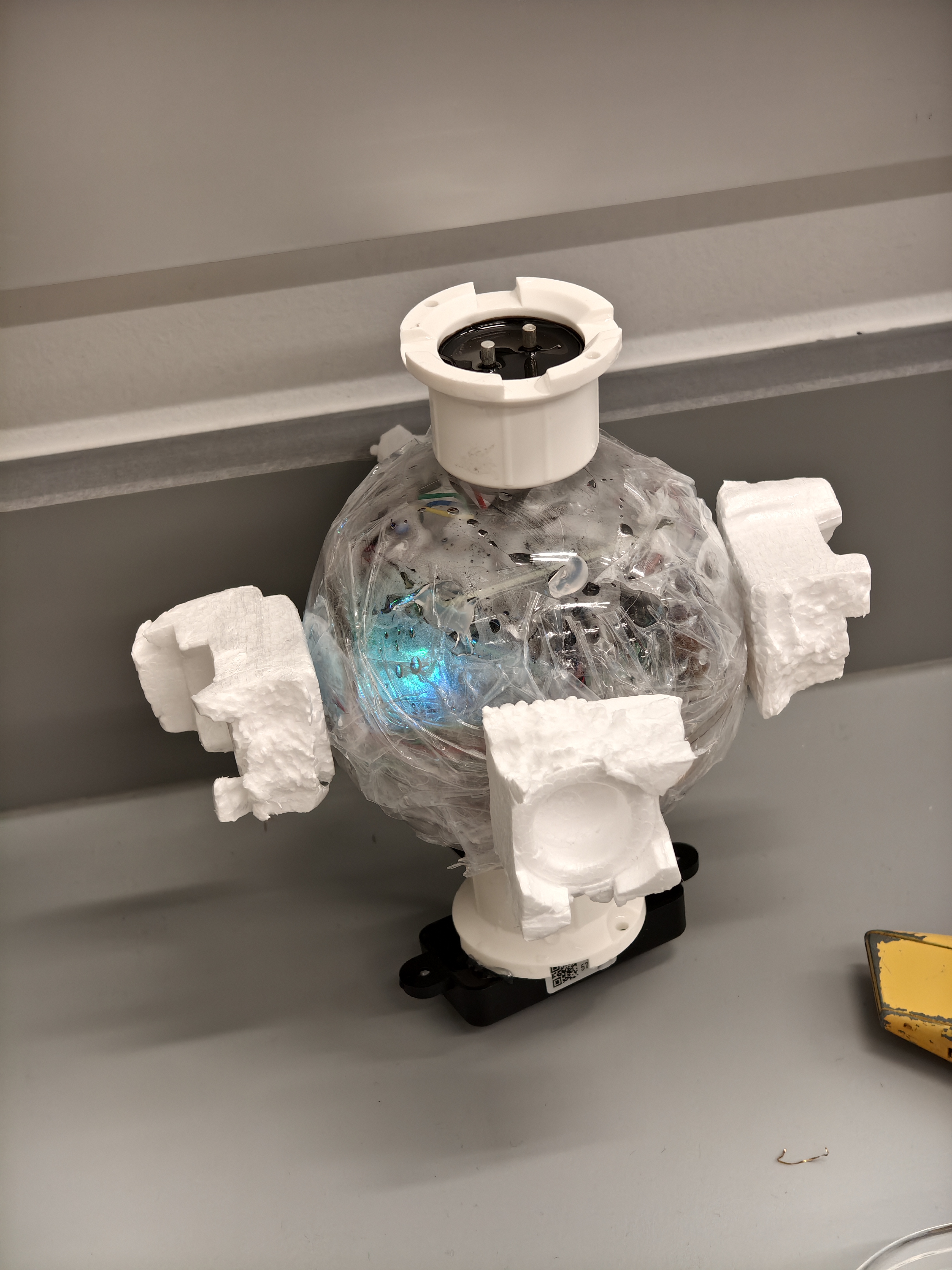 Assembled CyberRod device in transparent spherical enclosure