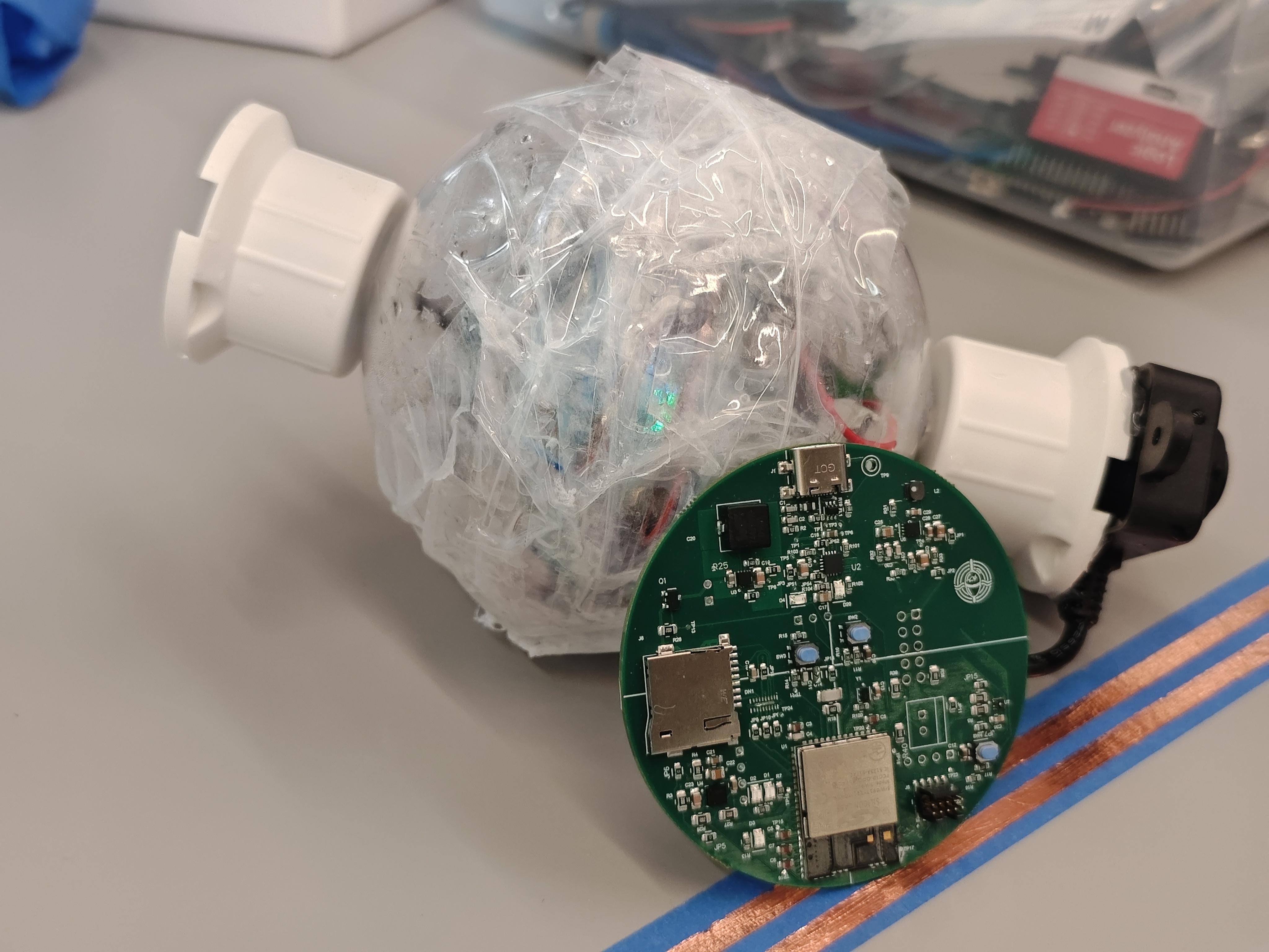 PCB close-up with MCU, Wi-Fi module, and sensor wiring